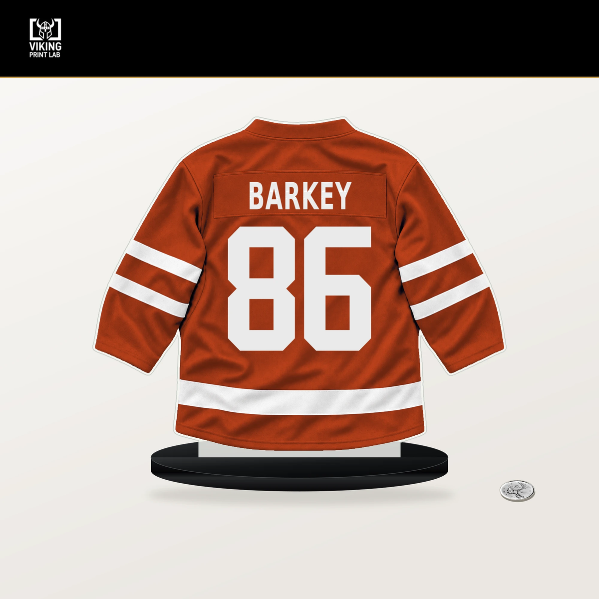 Denver Barkey number 86 Philadelphia Flyers jersey stand with included black base.