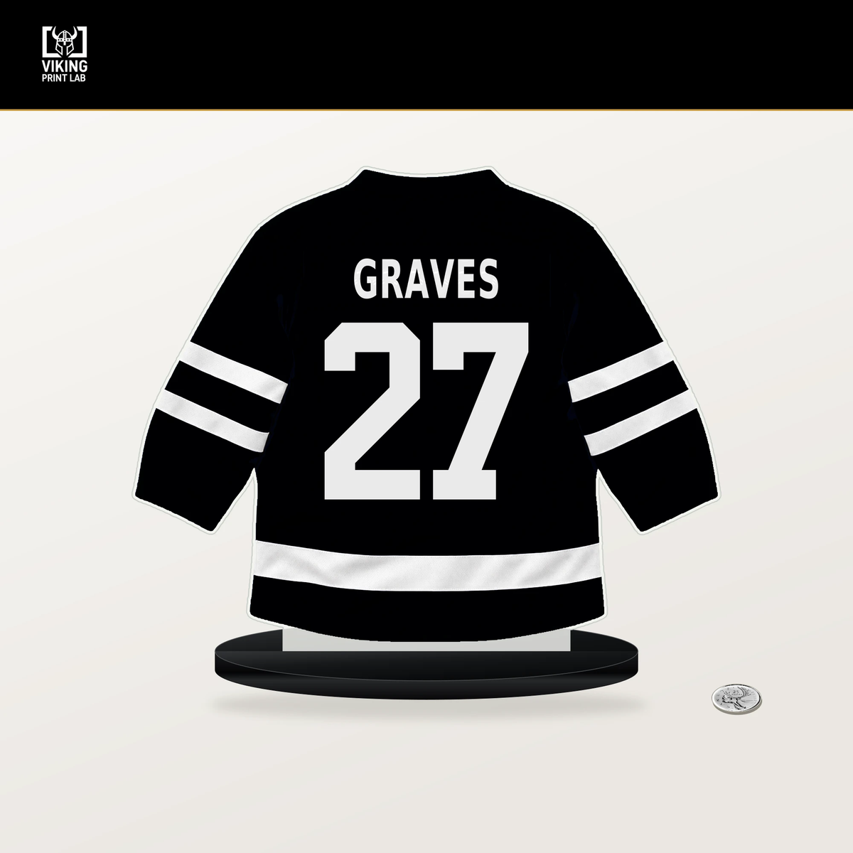 Ryan Graves number 27 Pittsburgh Penguins jersey stand with included black base.