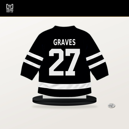 Ryan Graves number 27 Pittsburgh Penguins jersey stand with included black base.