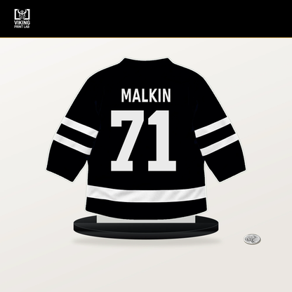 Evgeni Malkin number 71 Pittsburgh Penguins jersey stand with included black base.