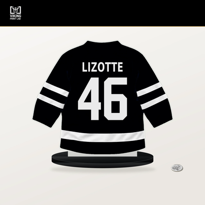 Blake Lizotte number 46 Pittsburgh Penguins jersey stand with included black base.