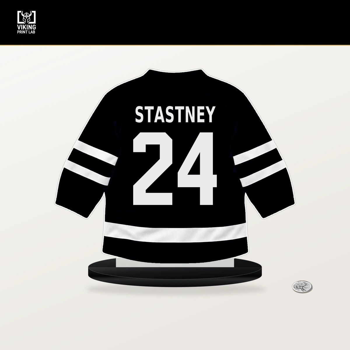 Spencer Stastney number 24 Pittsburgh Penguins jersey stand with included black base.