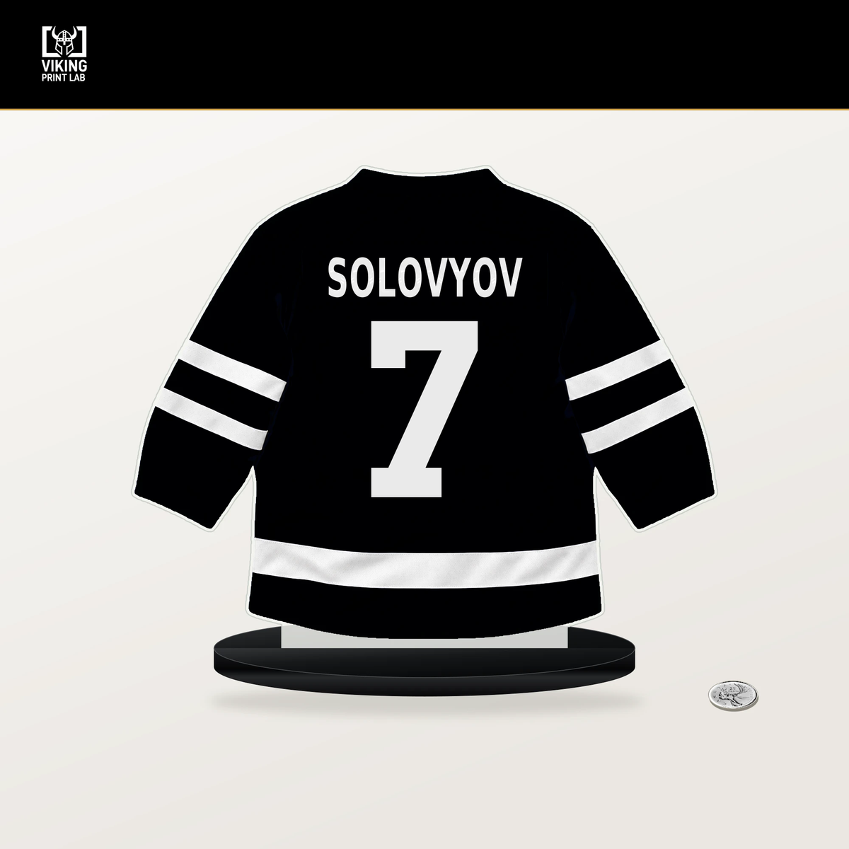 Ilya Solovyov number 7 Pittsburgh Penguins jersey stand with included black base.