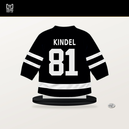 Ben Kindel number 81 Pittsburgh Penguins jersey stand with included black base.