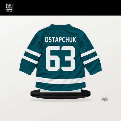 Zack Ostapchuk number 63 San Jose Sharks jersey stand with included black base.