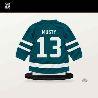 Quentin Musty number 13 San Jose Sharks jersey stand with included black base.