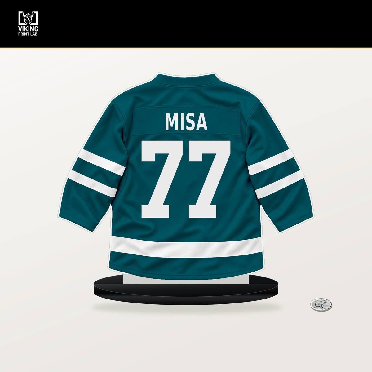 Michael Misa number 77 San Jose Sharks jersey stand with included black base.