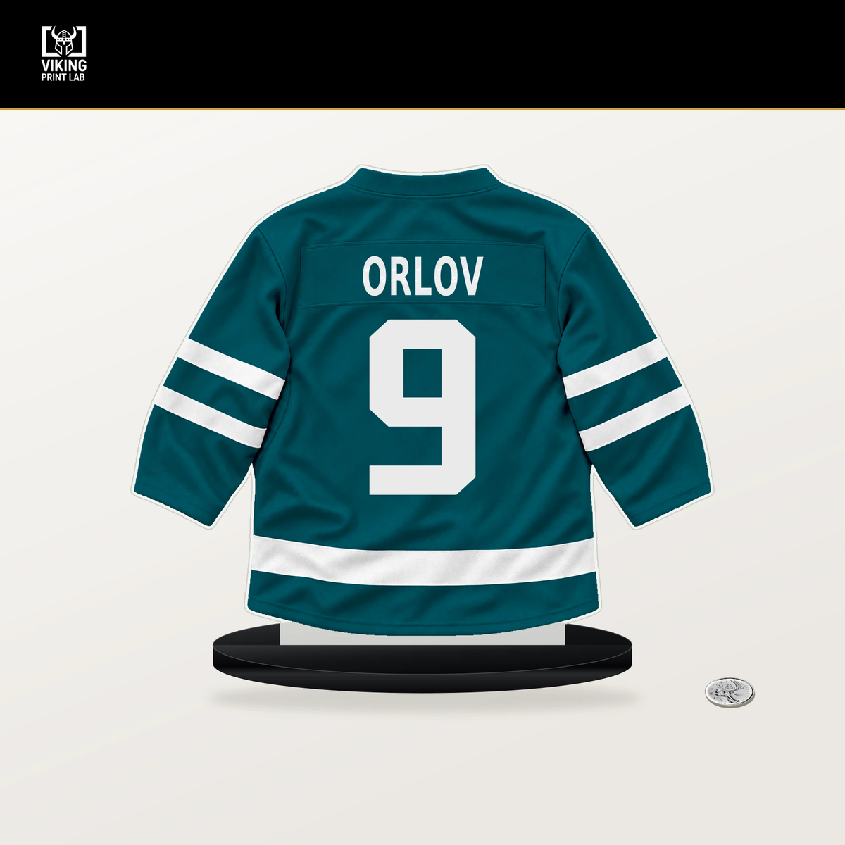 Dmitry Orlov number 9 San Jose Sharks jersey stand with included black base.