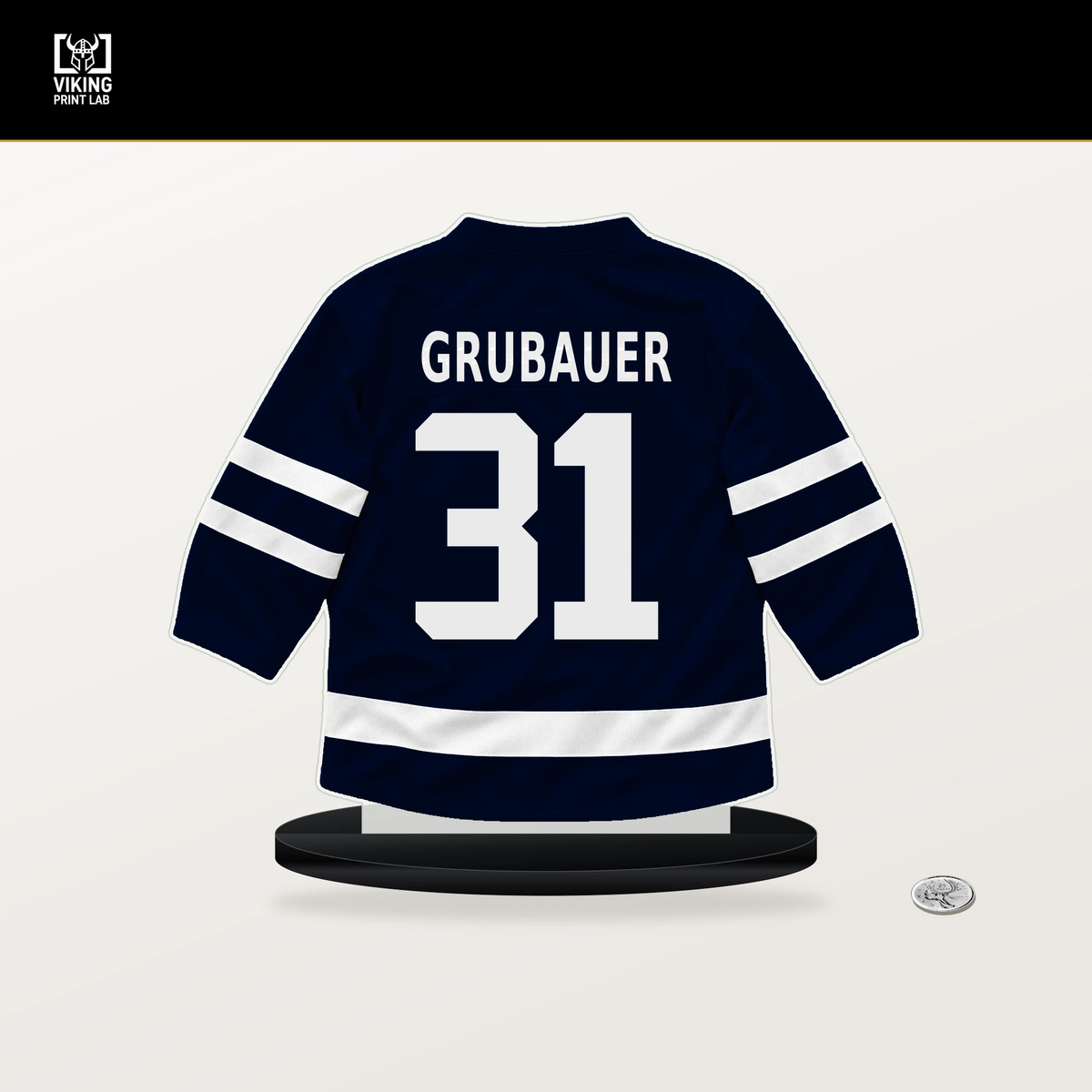 Philipp Grubauer number 31 Seattle Kraken jersey stand with included black base.