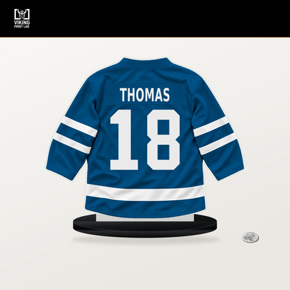 Robert Thomas number 18 St. Louis Blues jersey stand with included black base.