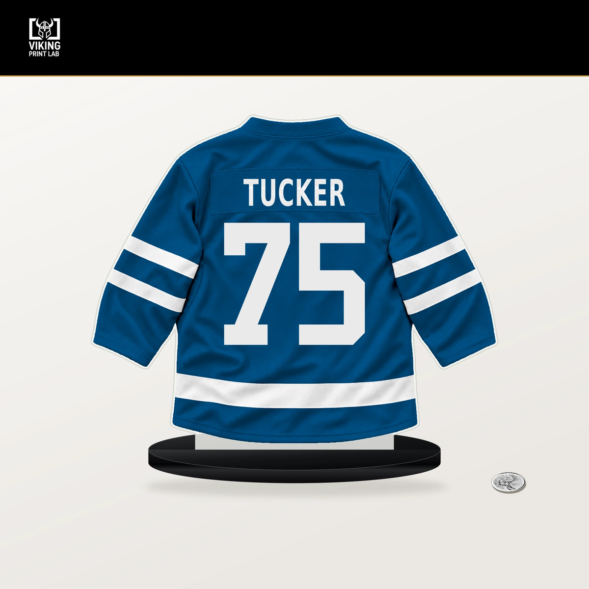 Tyler Tucker number 75 St. Louis Blues jersey stand with included black base.