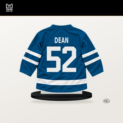 Zach Dean number 52 St. Louis Blues jersey stand with included black base.