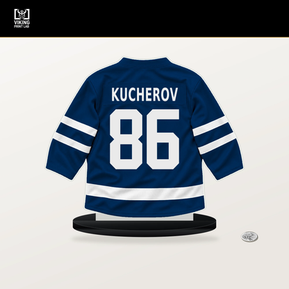 Nikita Kucherov number 86 Tampa Bay Lightning jersey stand with included black base.