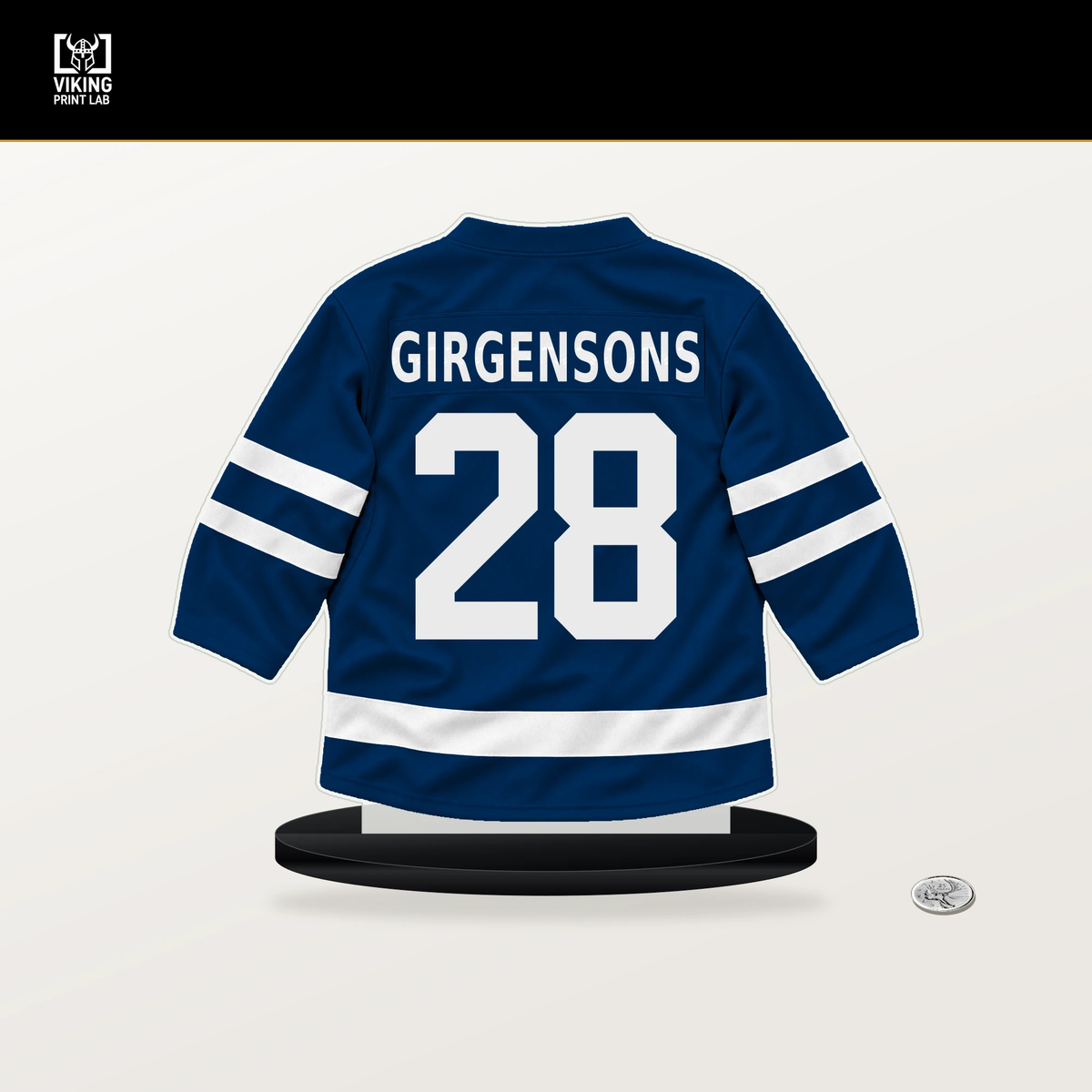 Zemgus Girgensons number 28 Tampa Bay Lightning jersey stand with included black base.