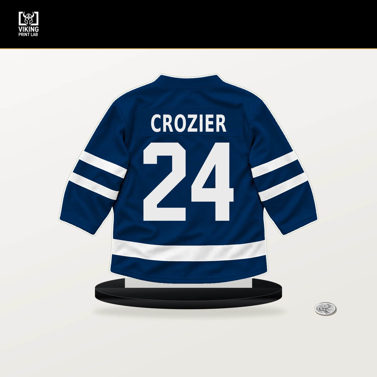 Maxwell Crozier number 24 Tampa Bay Lightning jersey stand with included black base.