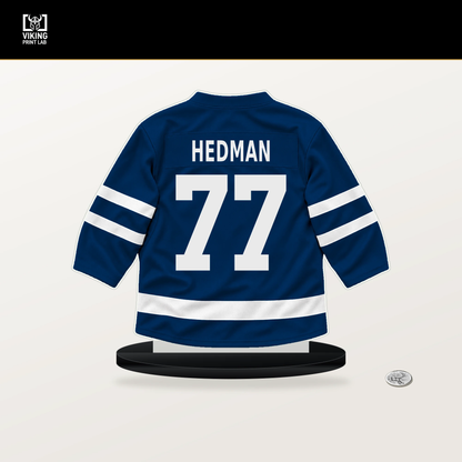 Victor Hedman number 77 Tampa Bay Lightning jersey stand with included black base.