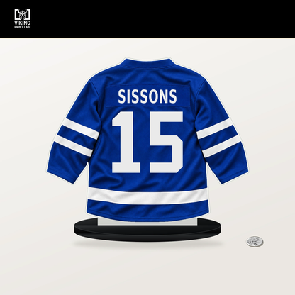 Colton Sissons number 15 Toronto Maple Leafs jersey stand with included black base.