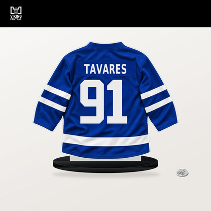John Tavares number 91 Toronto Maple Leafs jersey stand with included black base.