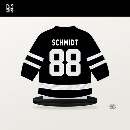 Nate Schmidt number 88 Utah Mammoth jersey stand with included black base.