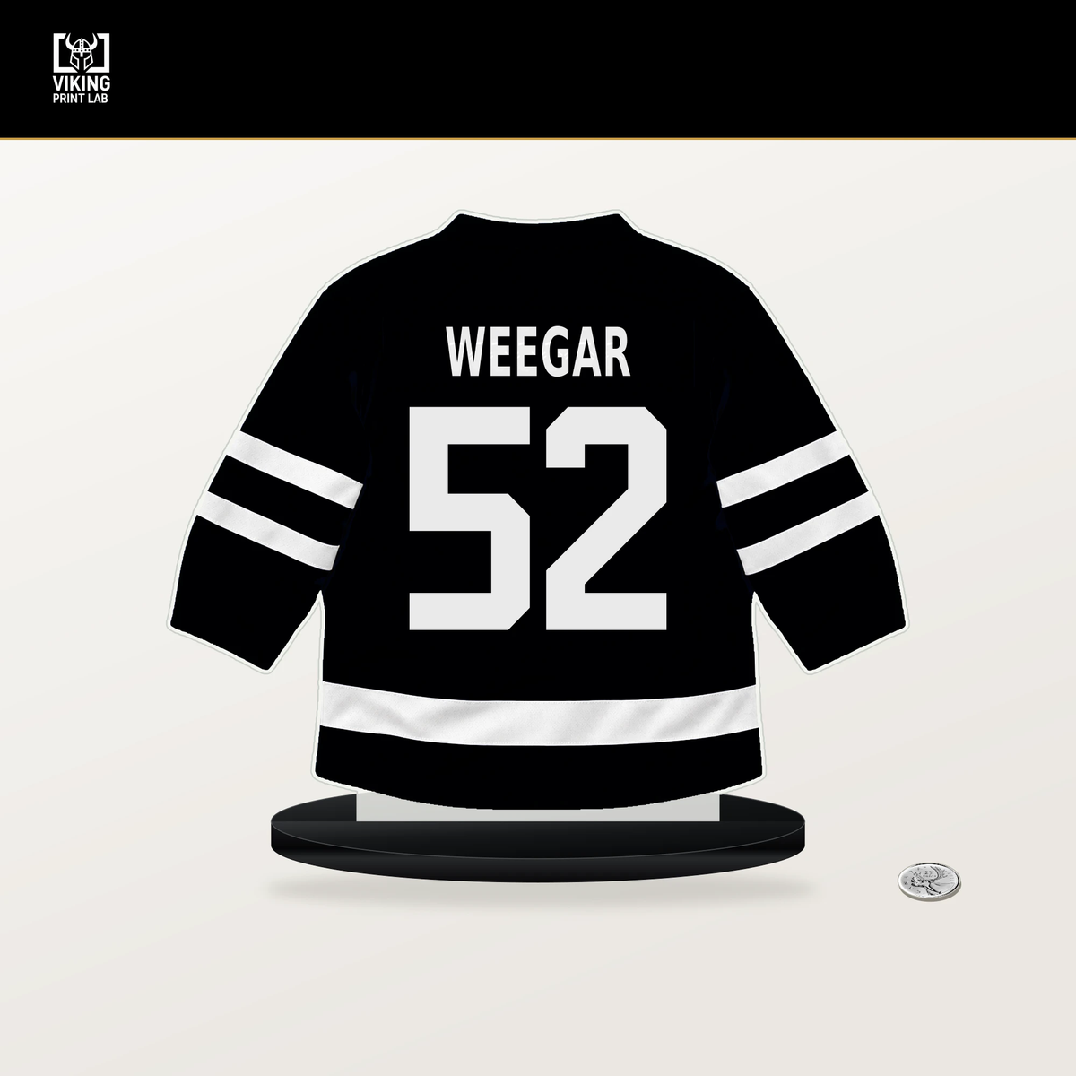 MacKenzie Weegar number 52 Utah Mammoth jersey stand with included black base.