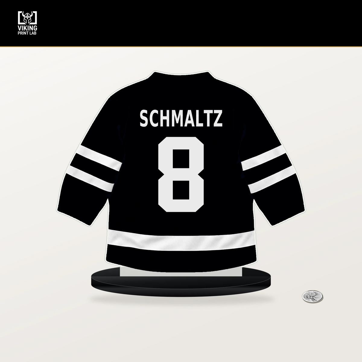 Nick Schmaltz number 8 Utah Mammoth jersey stand with included black base.