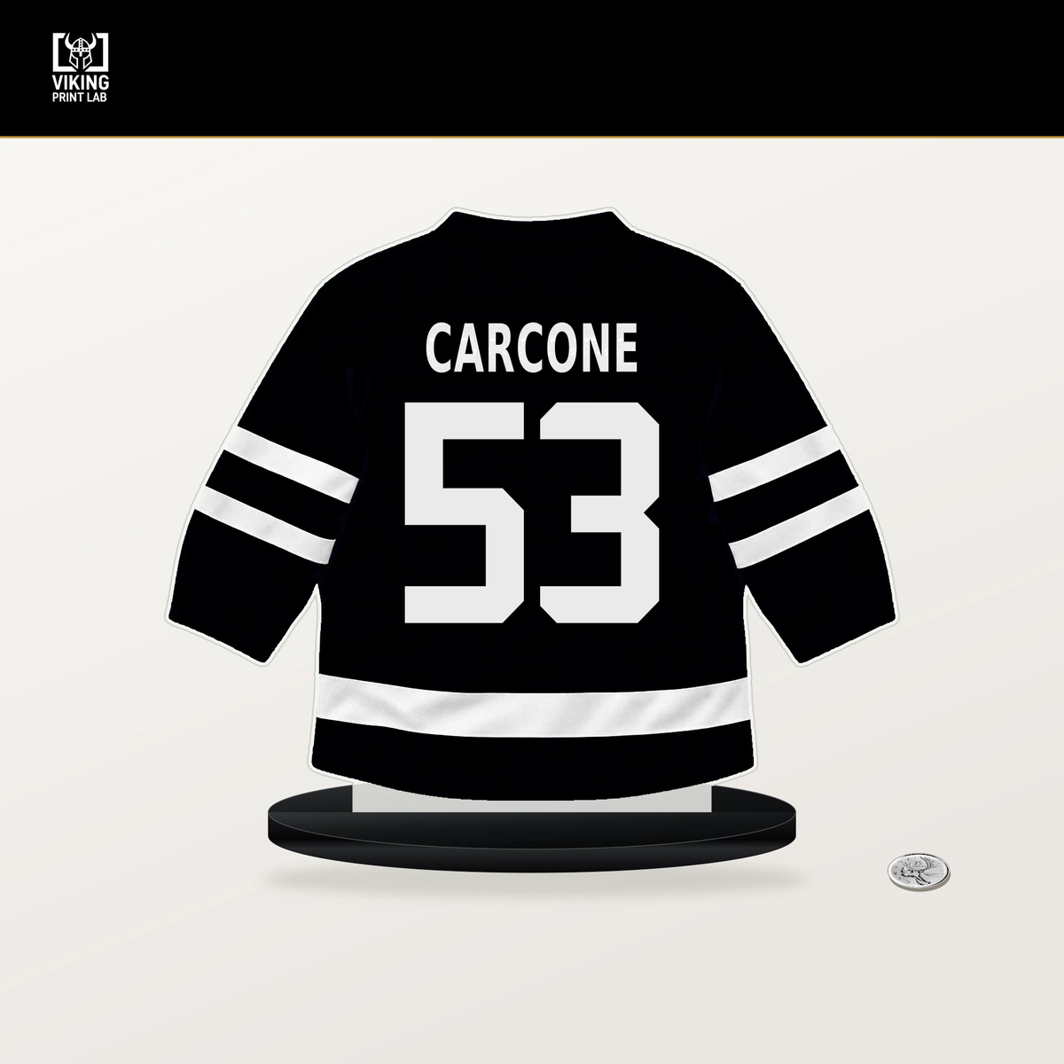 Michael Carcone number 53 Utah Mammoth jersey stand with included black base.