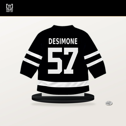 Nick DeSimone number 57 Utah Mammoth jersey stand with included black base.