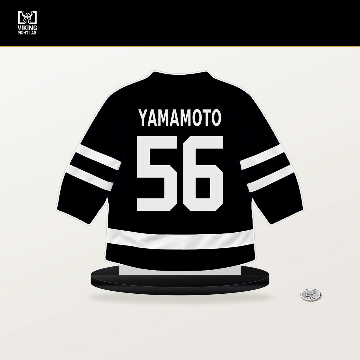Kailer Yamamoto number 56 Utah Mammoth jersey stand with included black base.
