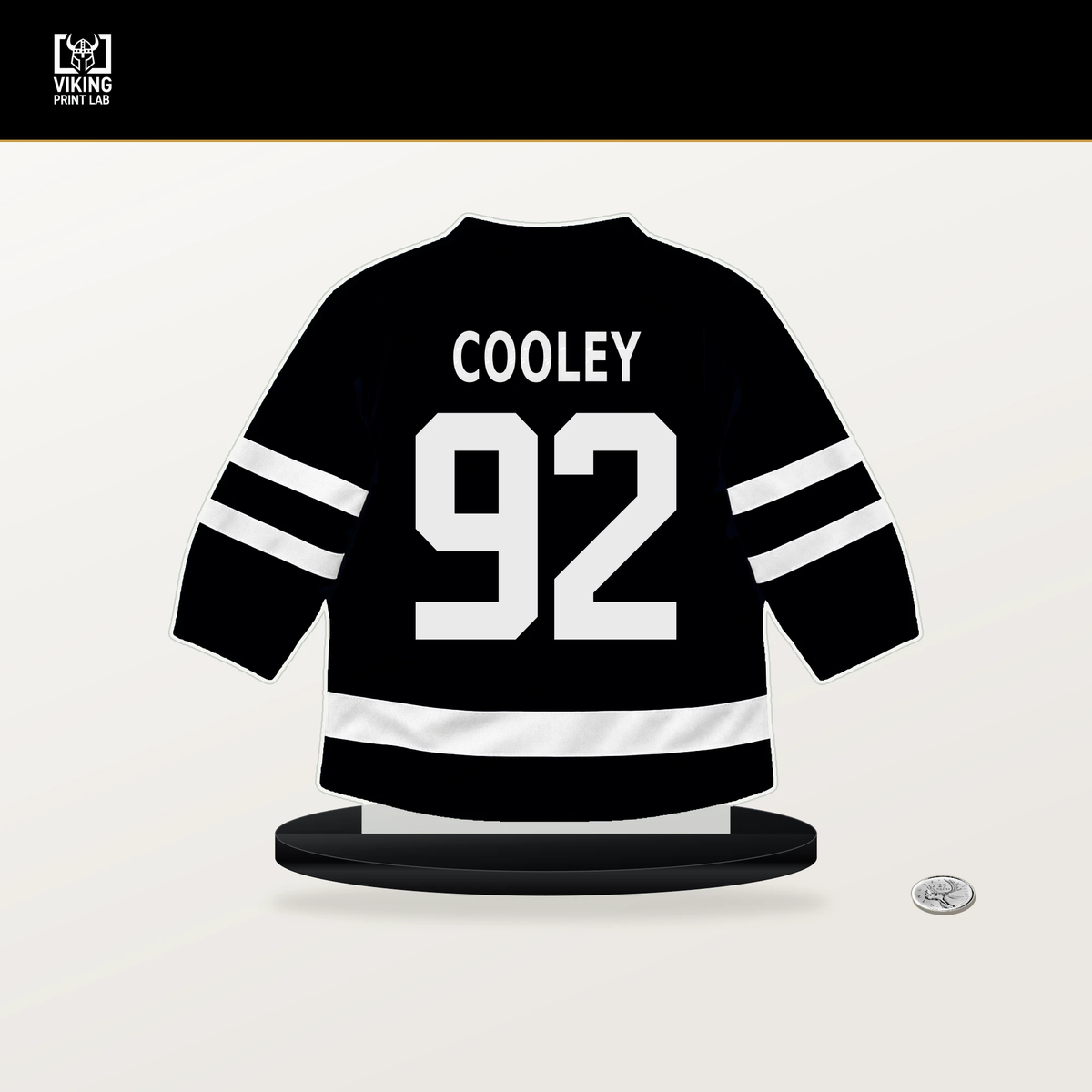 Logan Cooley number 92 Utah Mammoth jersey stand with included black base.