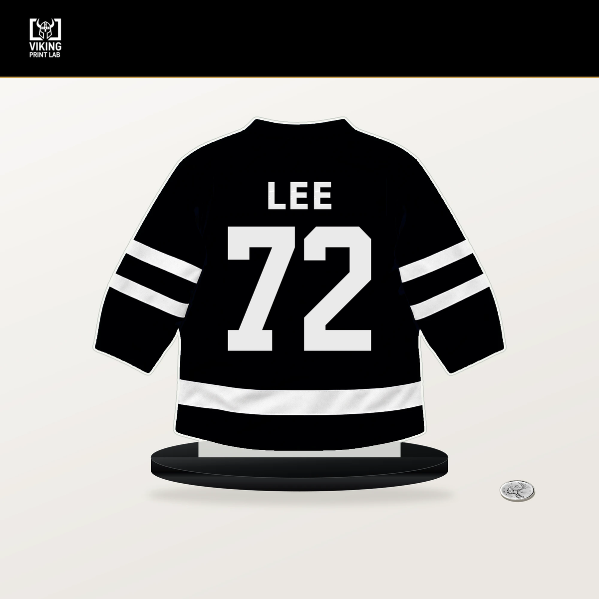 Anders Lee number 72 Utah Mammoth jersey stand with included black base.