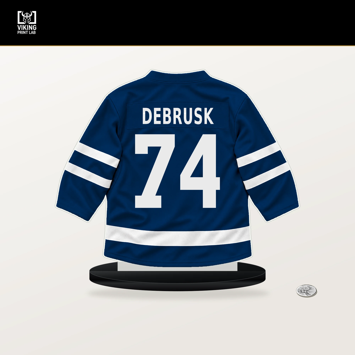 Jake DeBrusk number 74 Vancouver Canucks jersey stand with included black base.