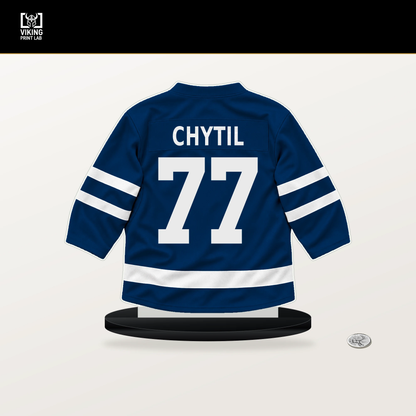 Filip Chytil number 77 Vancouver Canucks jersey stand with included black base.