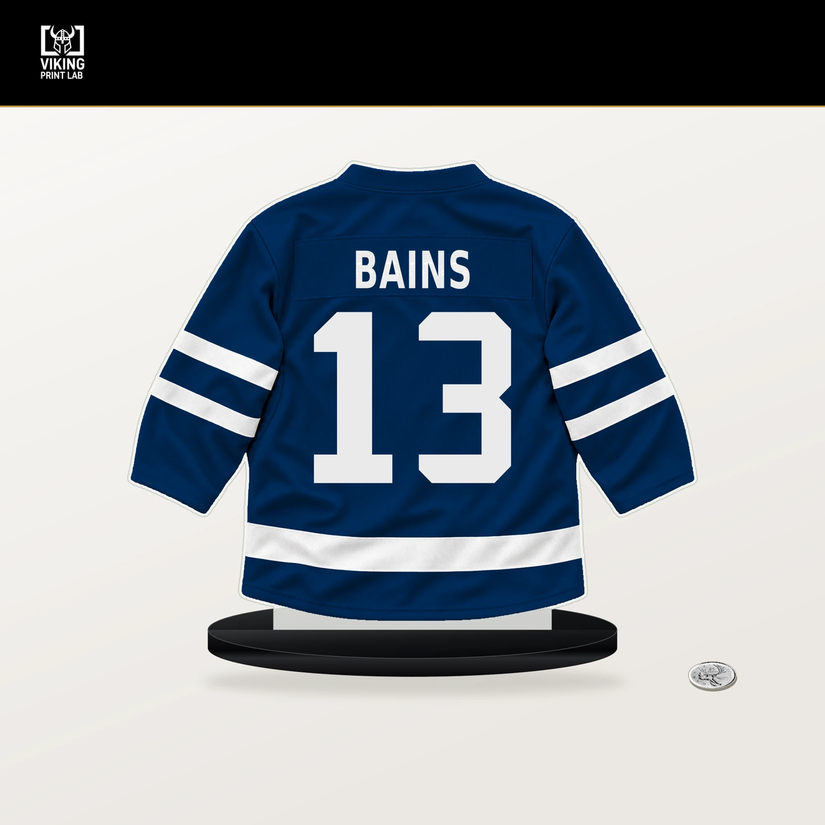 Arshdeep Bains number 13 Vancouver Canucks jersey stand with included black base.
