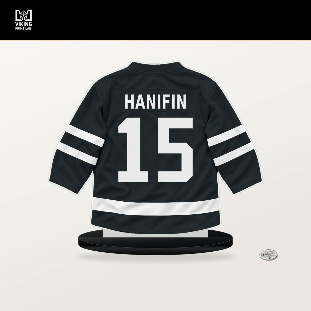 Noah Hanifin number 15 Vegas Golden Knights jersey stand with included black base.