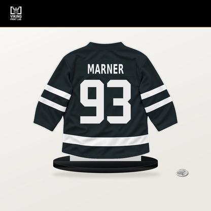 Mitch Marner number 93 Vegas Golden Knights jersey stand with included black base.