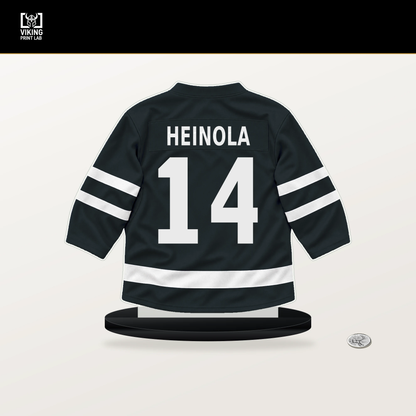 Ville Heinola number 14 Vegas Golden Knights jersey stand with included black base.