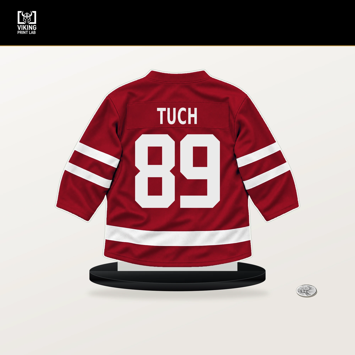 Alex Tuch number 89 Washington Capitals jersey stand with included black base.