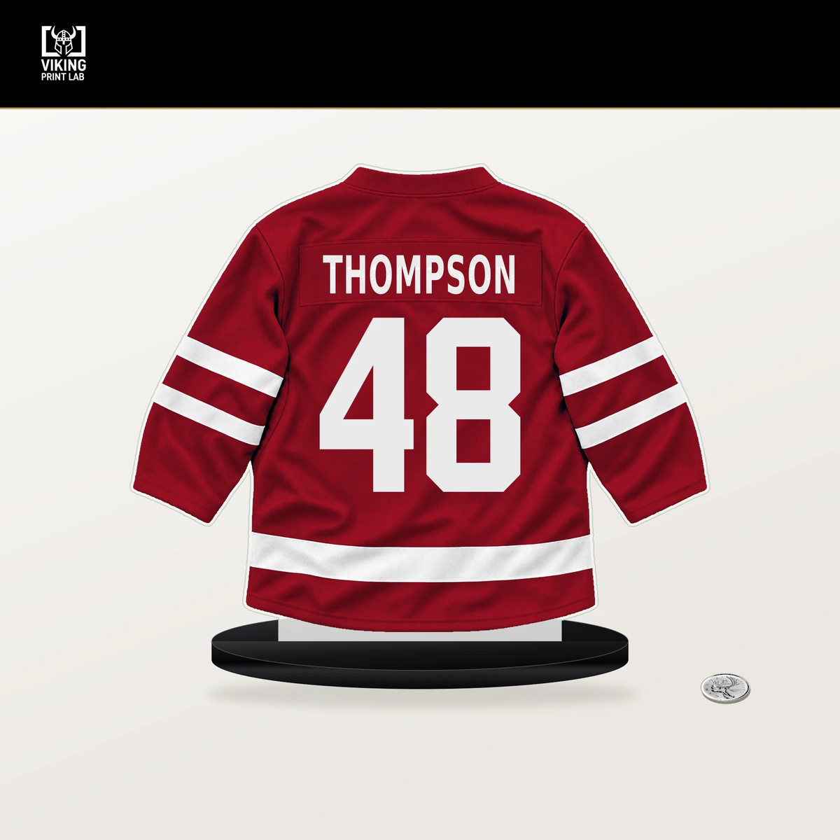 Logan Thompson number 48 Washington Capitals jersey stand with included black base.