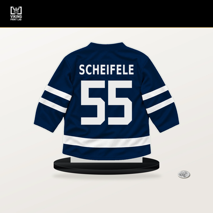 Mark Scheifele number 55 Winnipeg Jets jersey stand with included black base.