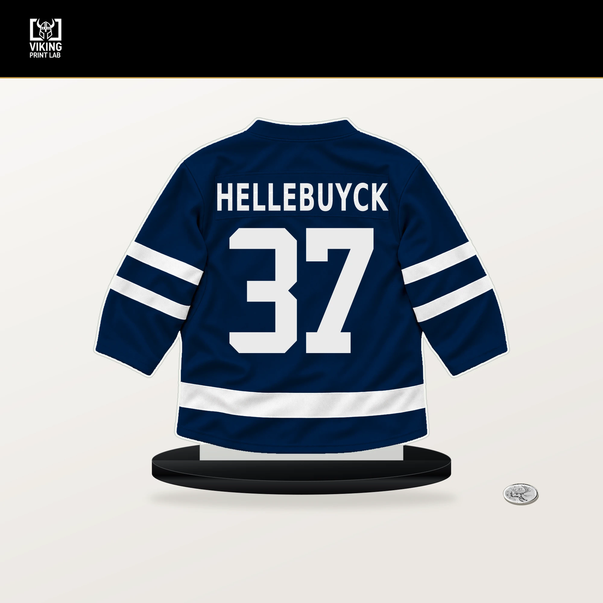 Connor Hellebuyck number 37 Winnipeg Jets jersey stand with included black base.