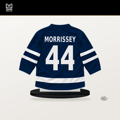Josh Morrissey number 44 Winnipeg Jets jersey stand with included black base.