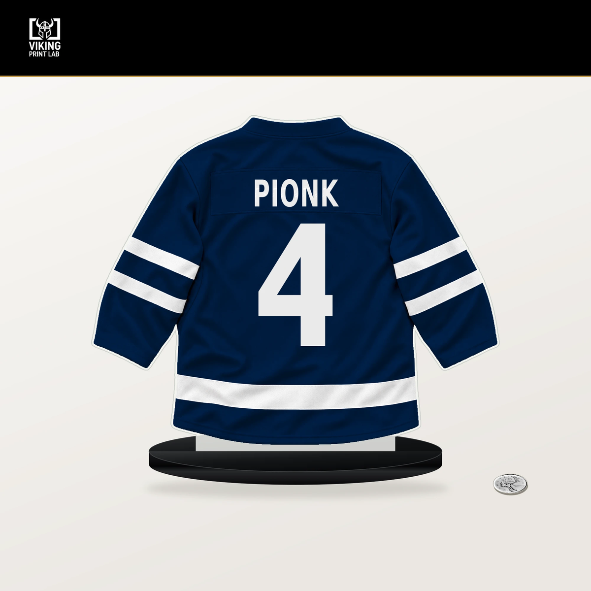 Neal Pionk number 4 Winnipeg Jets jersey stand with included black base.