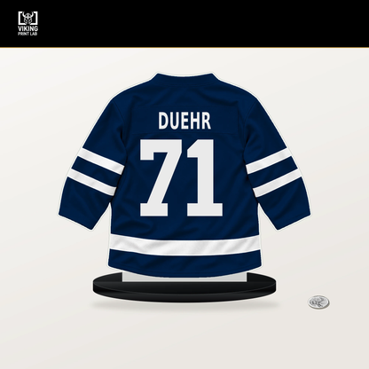 Walker Duehr number 71 Winnipeg Jets jersey stand with included black base.