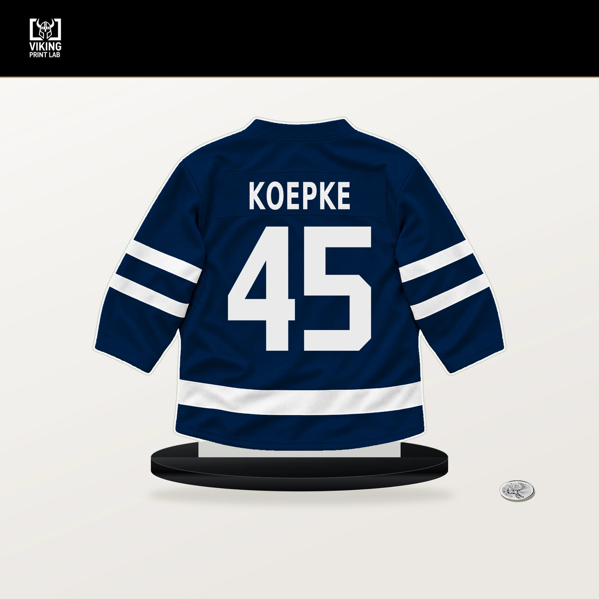 Cole Koepke number 45 Winnipeg Jets jersey stand with included black base.