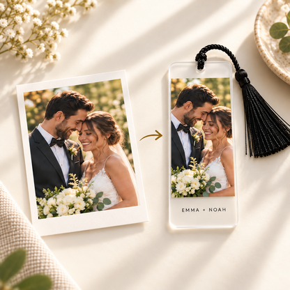 Digital mockup. Wedding photo beside a matching personalized frosted acrylic bookmark with a black tassel.