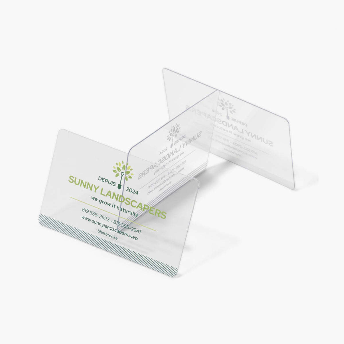 Clear plastic business cards with a landscaping design example.