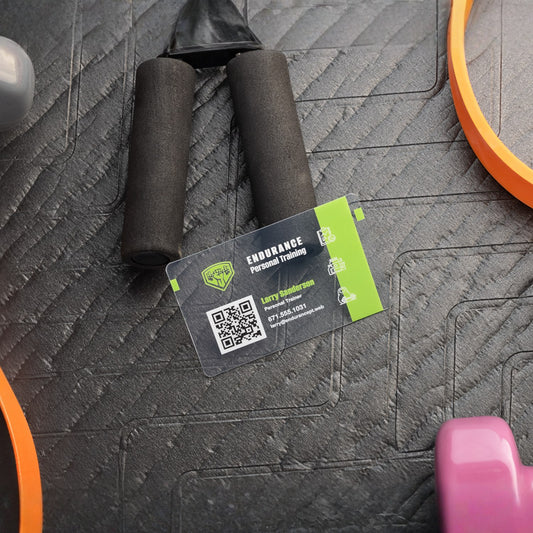 Clear plastic business card with a fitness design example.
