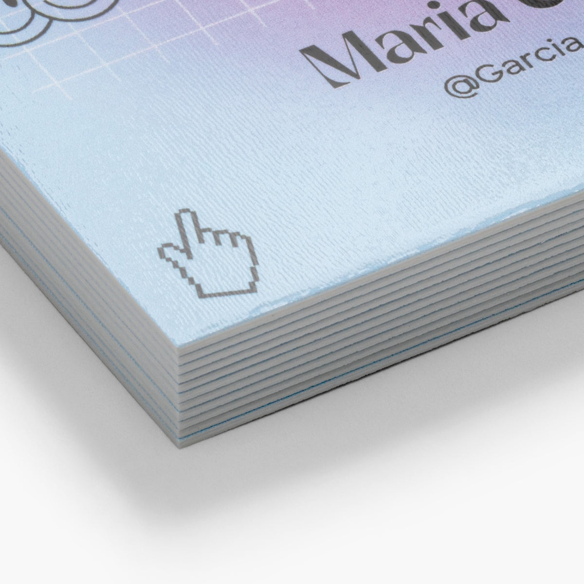 Close-up of a thick business card stack showing the substantial paper edge.