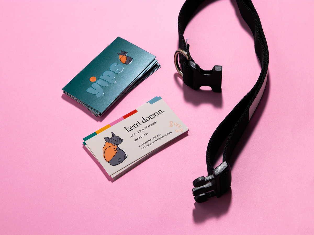 Embossed gloss business card examples for a dog-walking business.