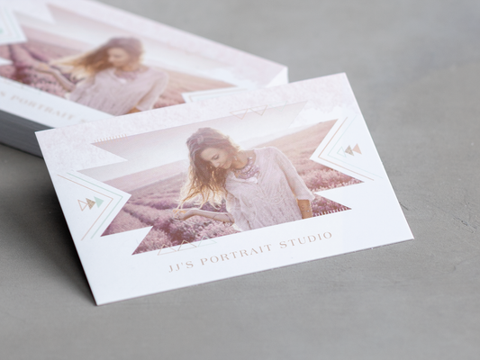 Soft touch business card examples for a portrait studio.